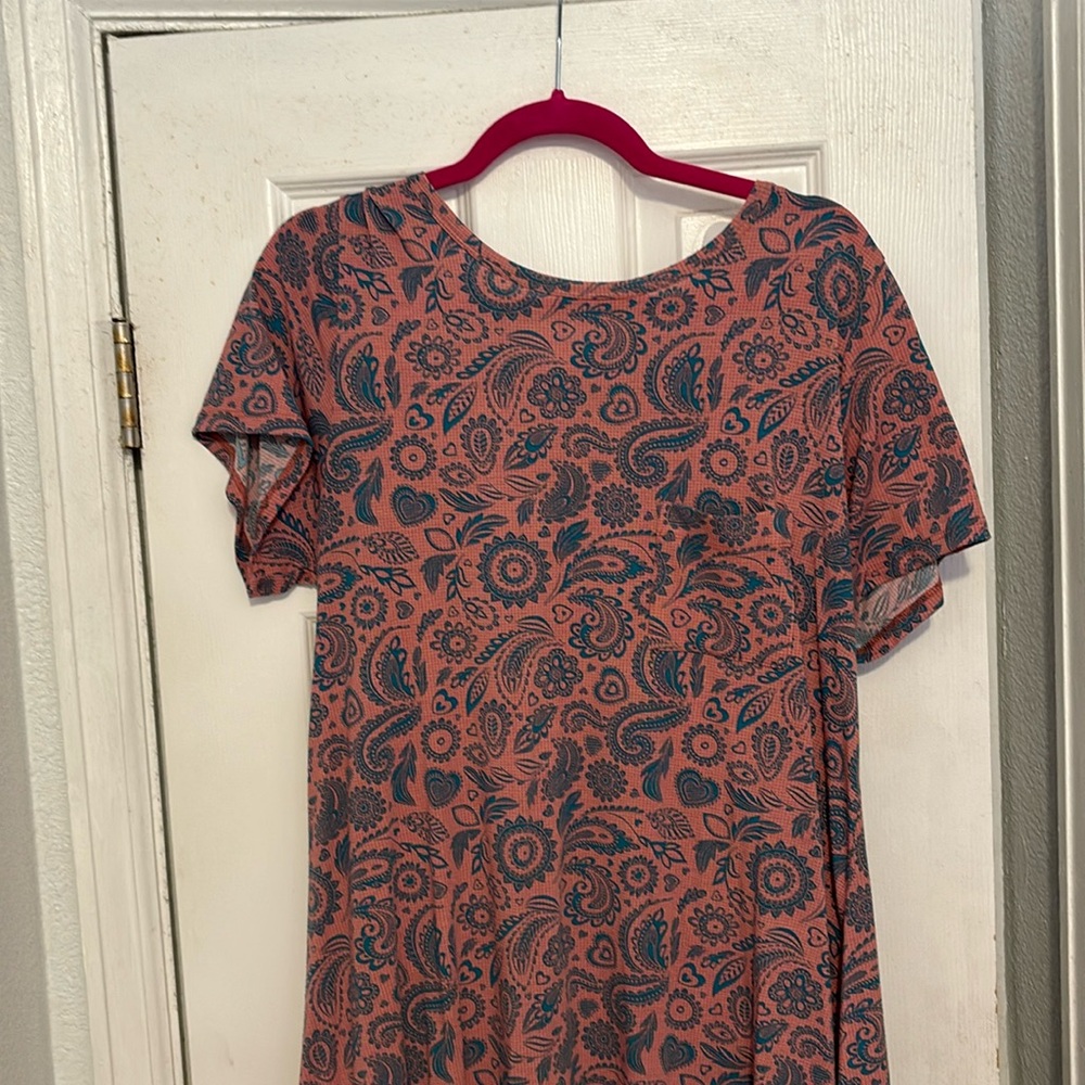 Retired hi lo Carly 95% poly 5% spandex . Great shape. Breast pocket . Pink/blue